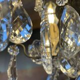 Three-light chandelier in bronze and cut crystal, early 20th century work.