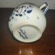 Henriot Quimper earthenware coffee set with floral decoration and elegant blue