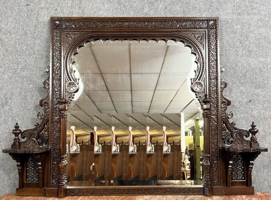 Monumental antique mirror in carved wood – Orientalist / Moorish style – late 19th century