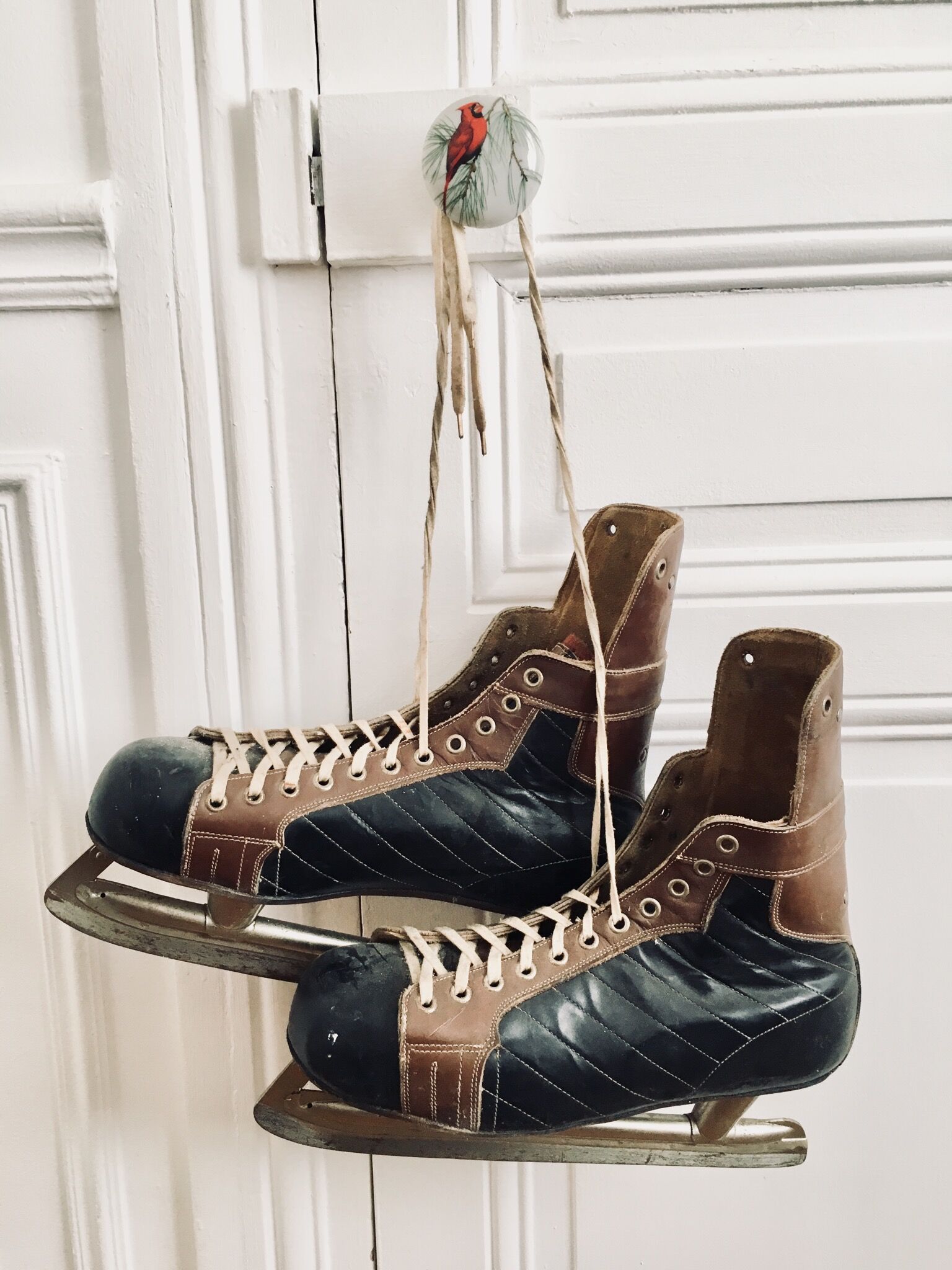 Pair of vintage lutra ice skates