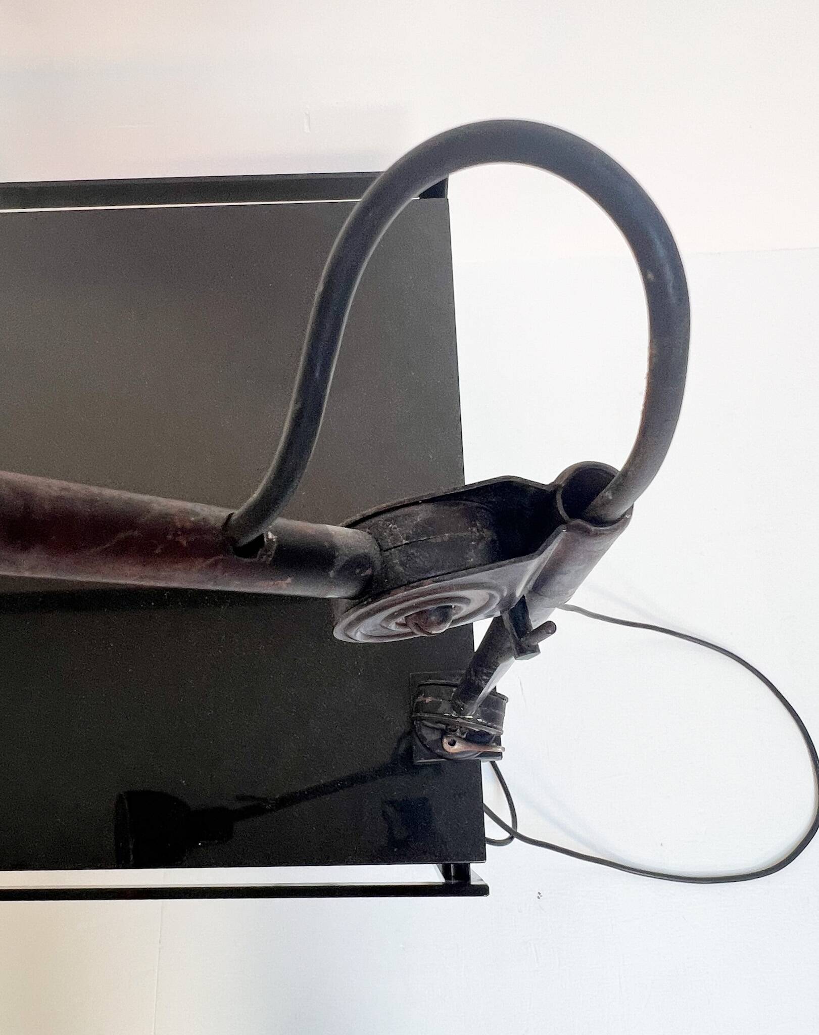 Industrial in height to be adjusted vintage clamp lamp from the 1970s