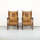 Ensemble de deux fauteuils anciens en cuir