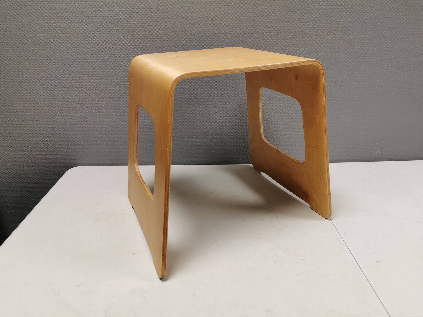 Beautiful design stool/side table made of curved plywood and designed by Lisa Norinder for Ikea.