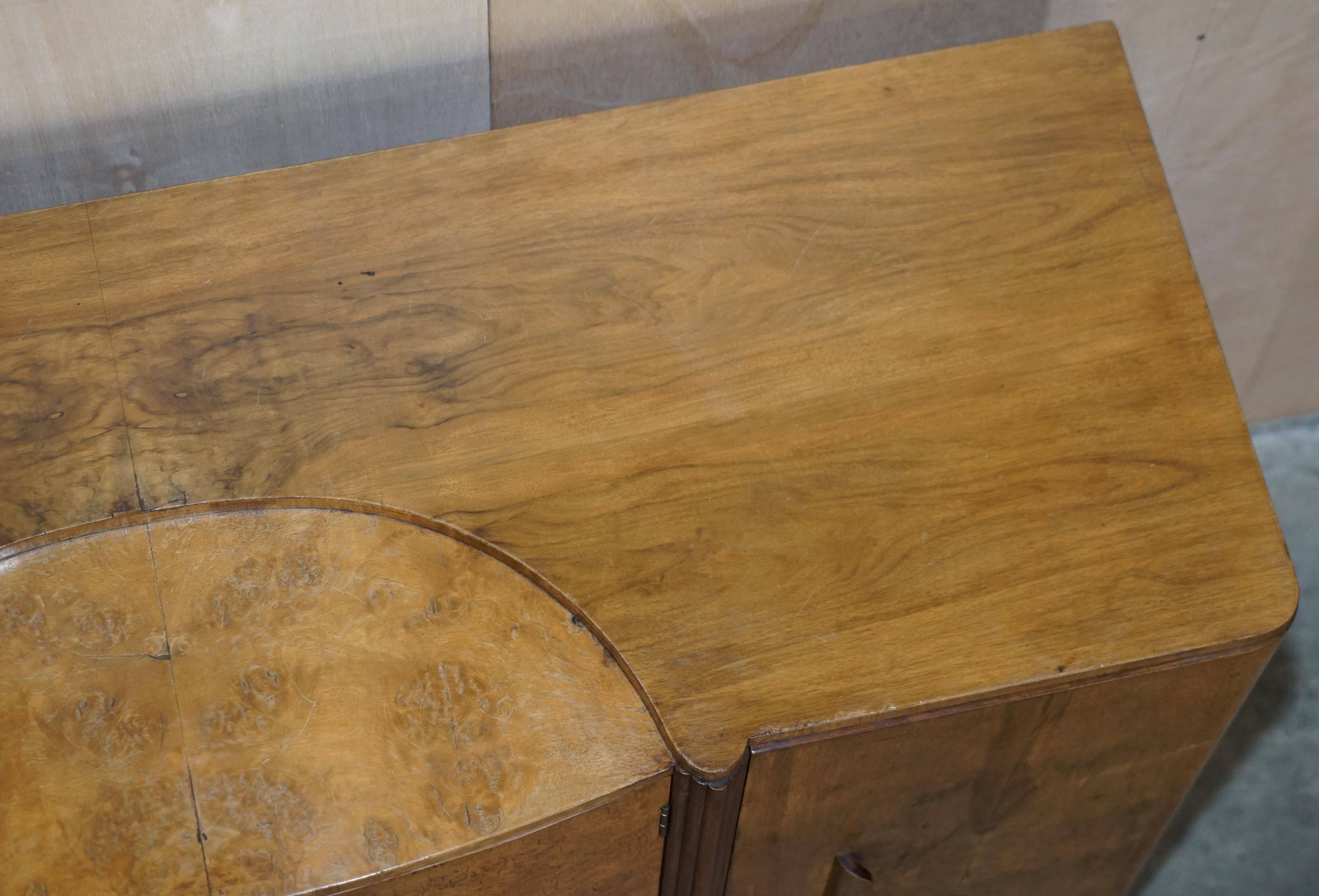 Art Deco walnut burr sideboard with drawers and bar.