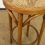 High stool in curved wood and cane seat