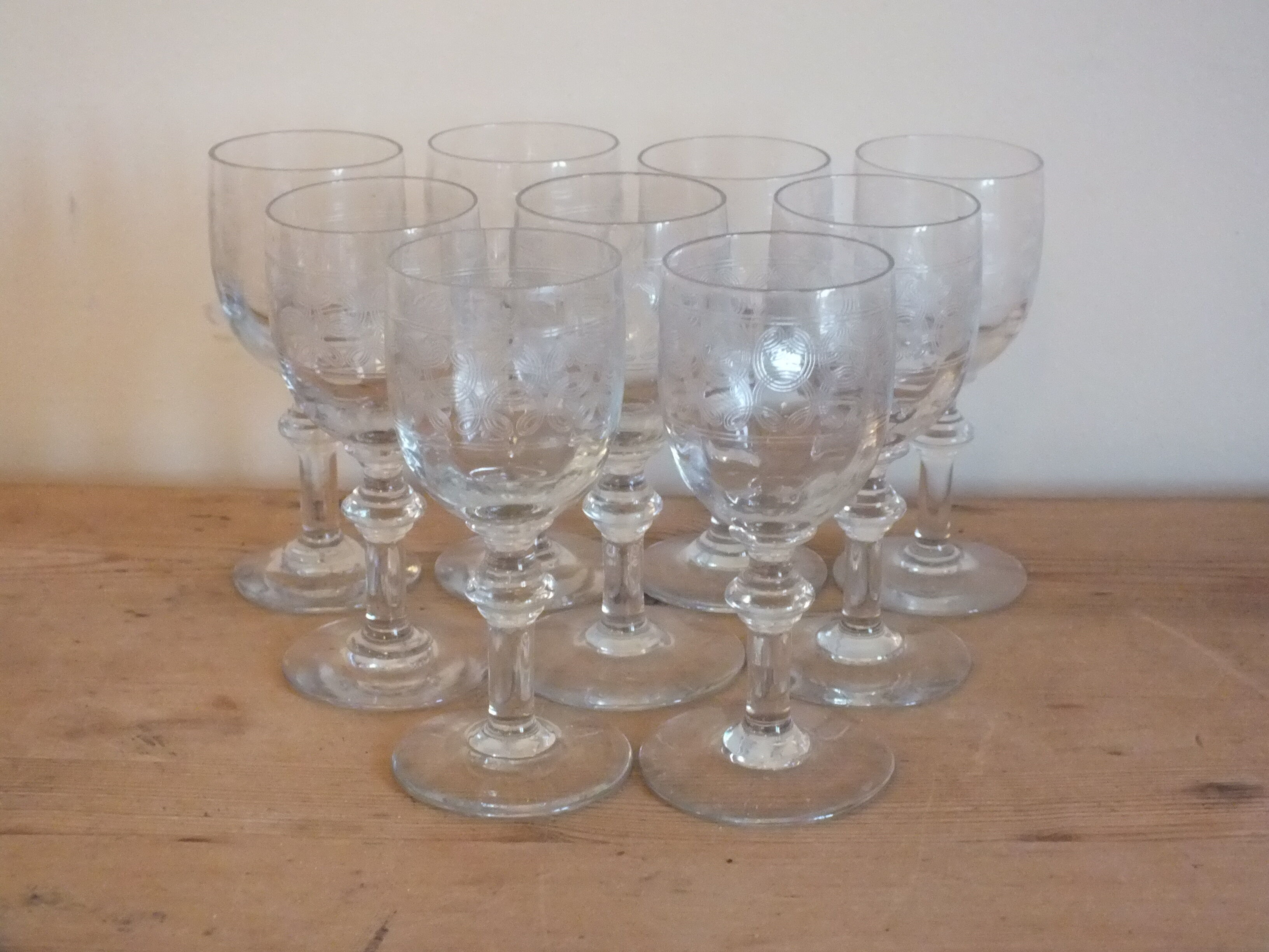 9 antique glasses in port or alcohol decorated with arabesques