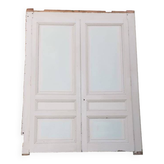 Pair of cupboard doors and old woodwork frame