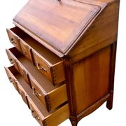 Secretary desk called "scriban" in Louis XV style made of fruitwood.