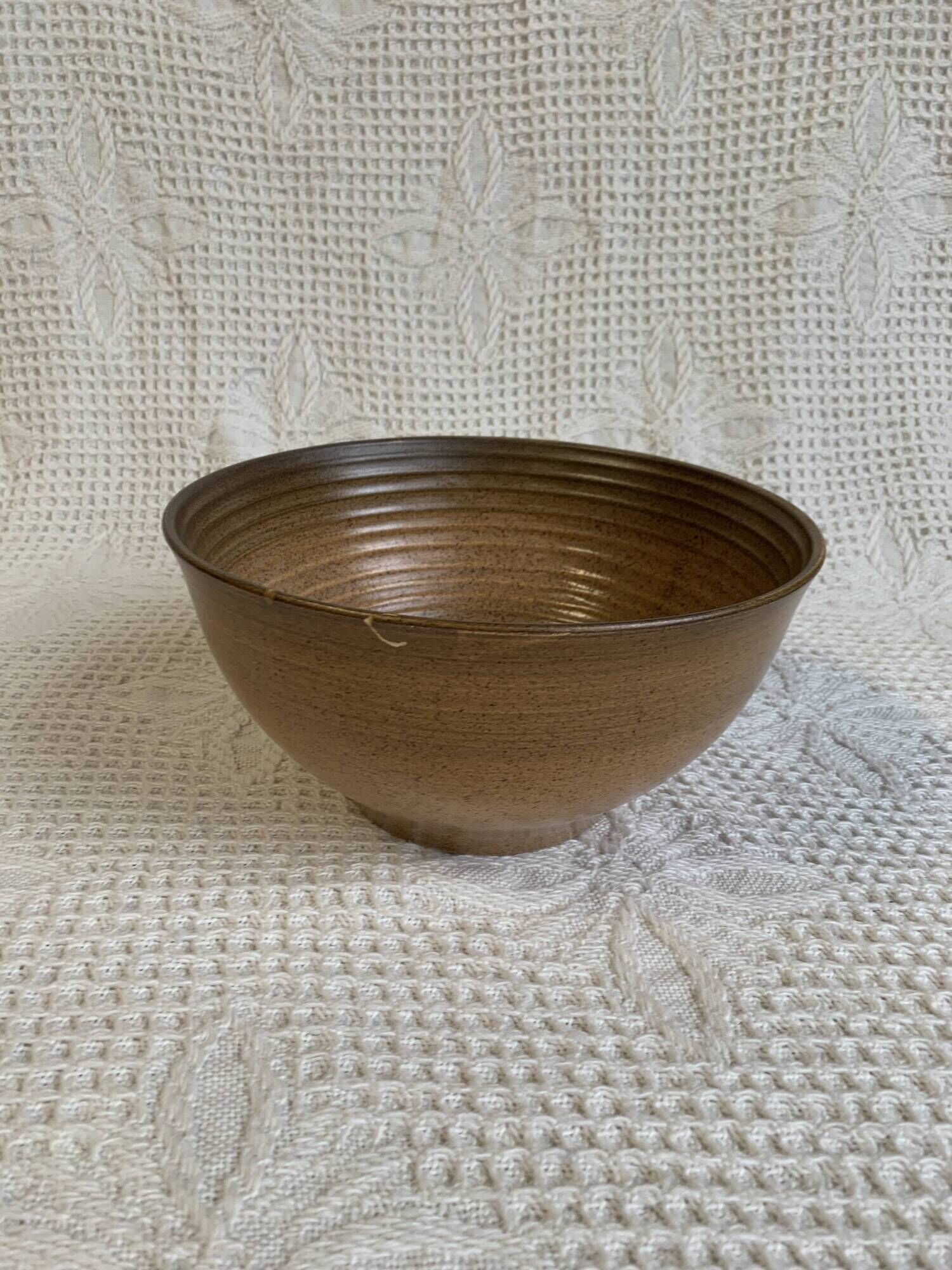 Large Longchamp glazed stoneware salad bowl, dating from the 1970s, in brown tones