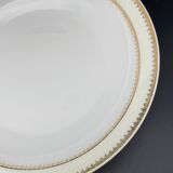 Plat rond creux en porcelaine de Limoges liseré jaune et doré
