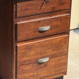 Modernist desk in wood and green moleskin upholstery