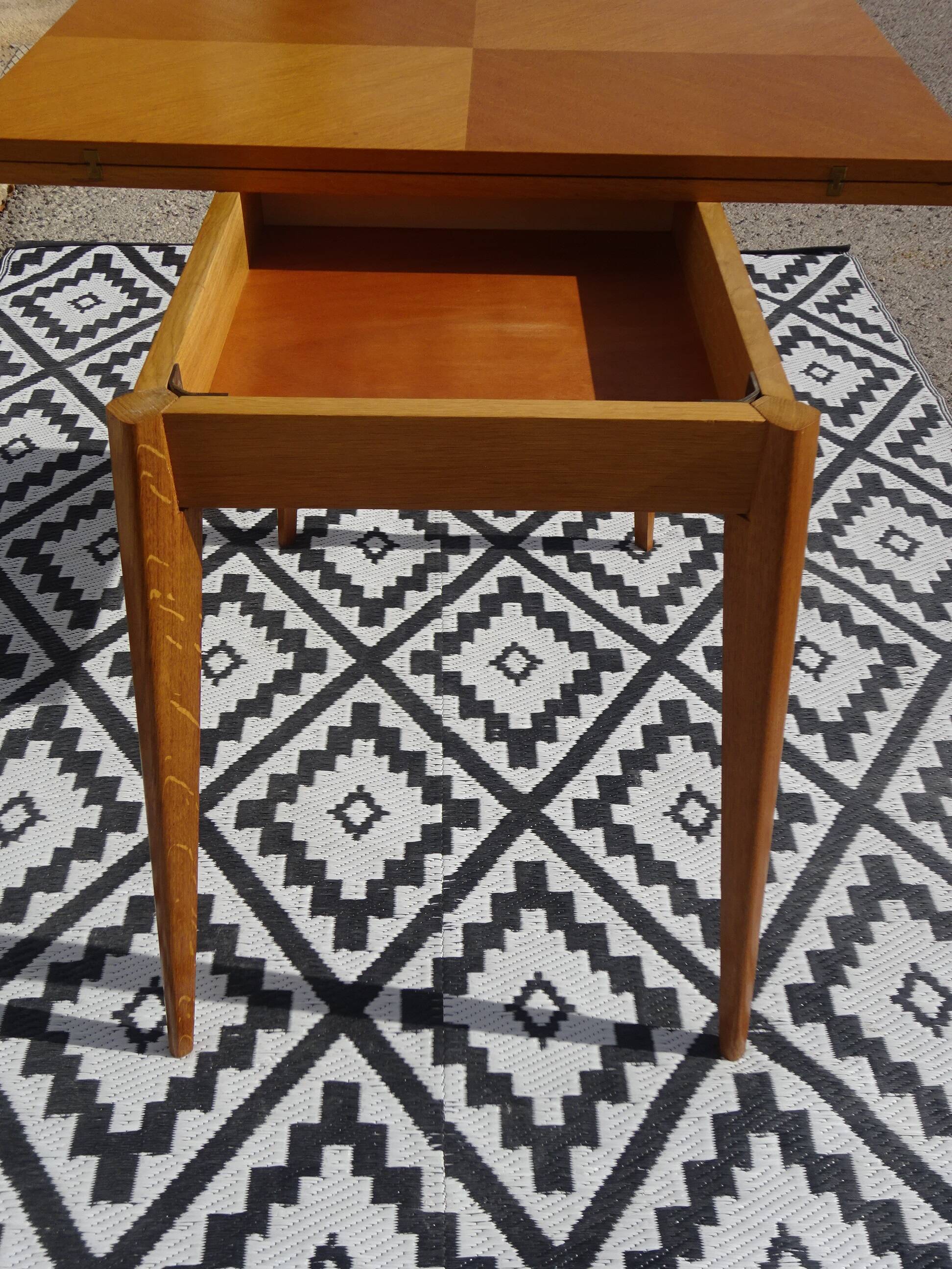 Scandinavian portfolio table model "half-century" by SAM