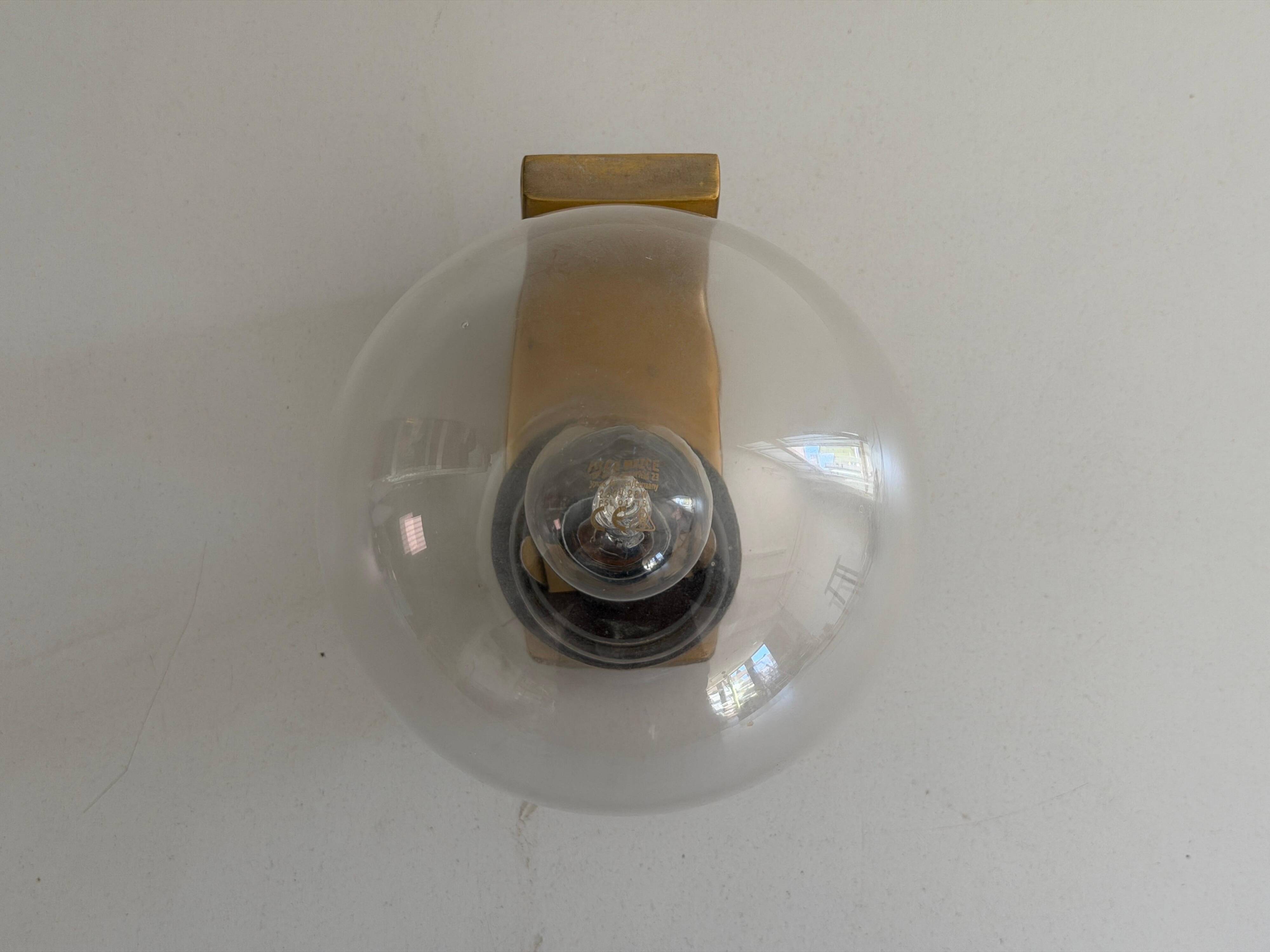 Simple glass and brass wall light from the mid-century, 1960, Germany.