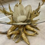 Round glass and brass table by designers Richard and Isabelle Faure