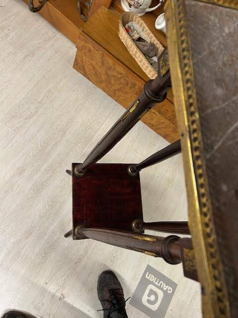 Wooden and brass saddle