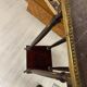 Wooden and brass saddle