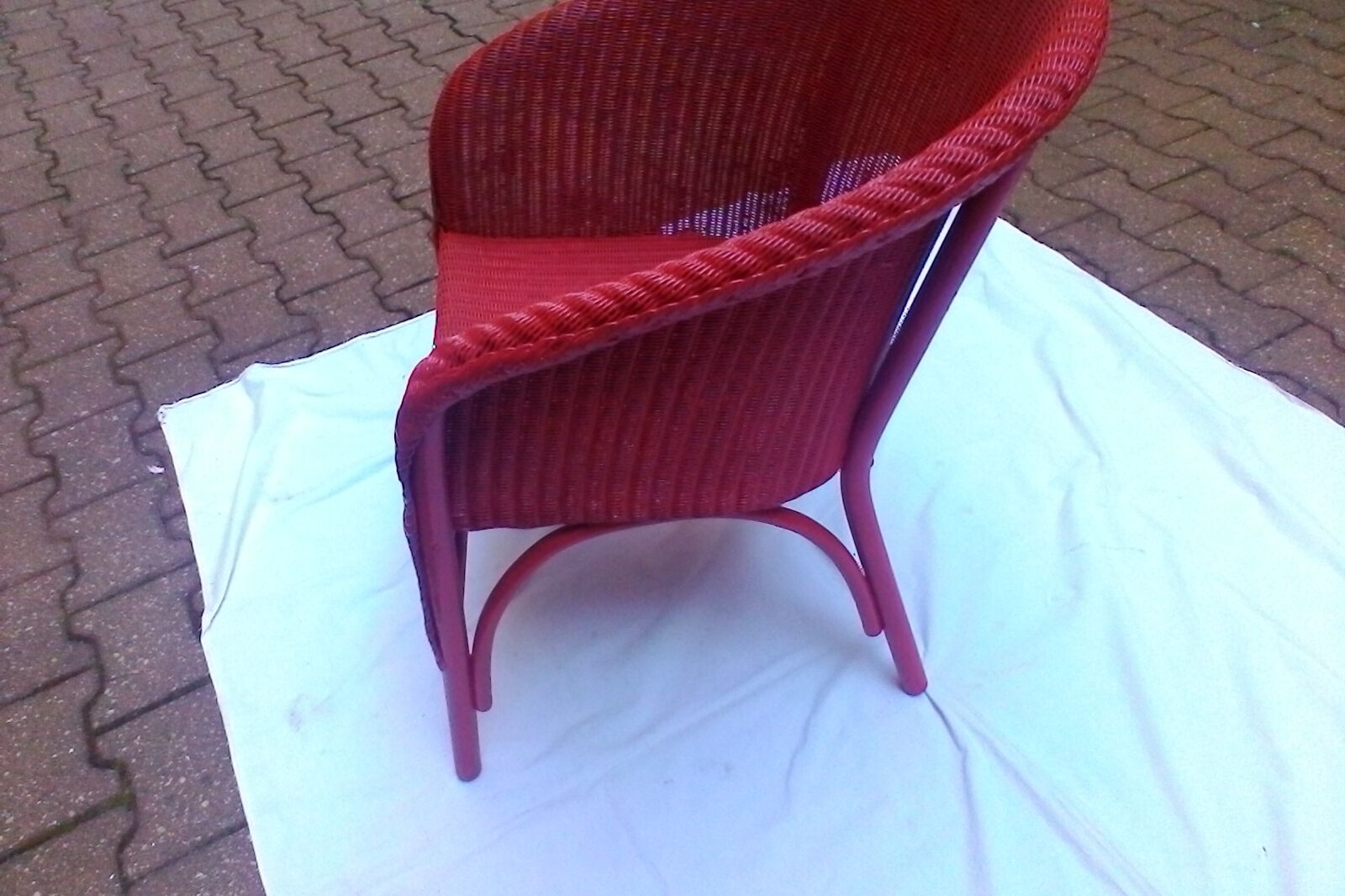 Vintage chair in red rattan