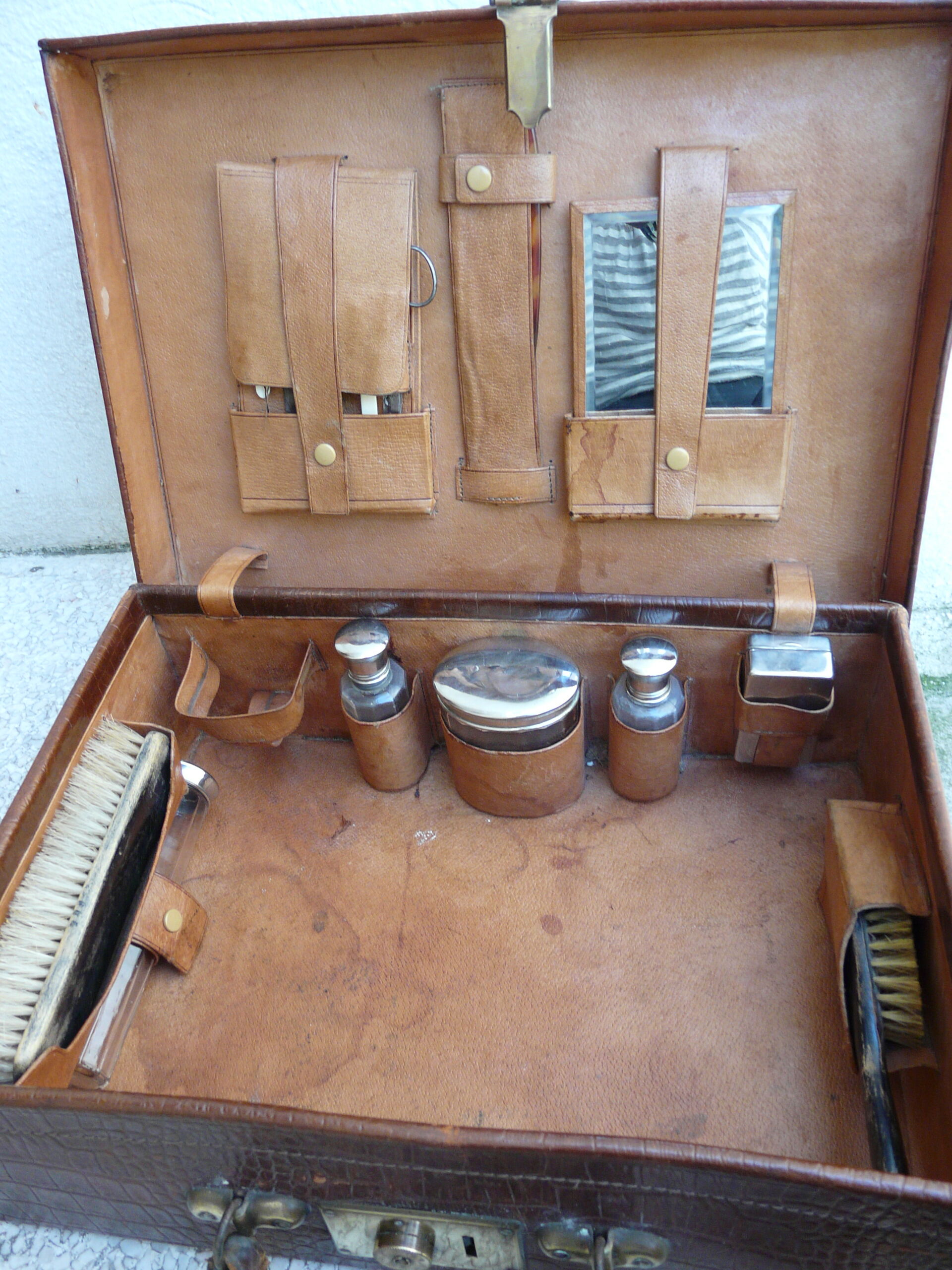 Leather and brass nineteenth monogrammed MCS suitcase