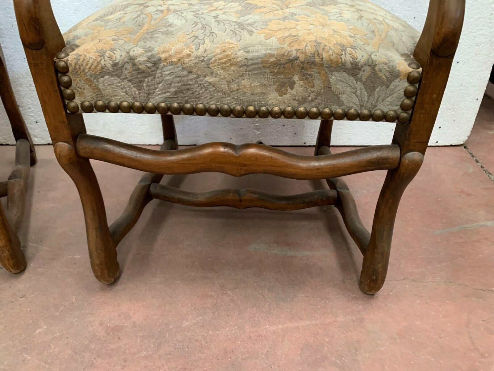 Pair of renaissance style armchairs in tinted beech XX century