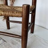 Chaise enfant vintage en bois foncé et assise en paille tressée