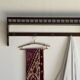 Antique wooden wall shelf with a turned gallery and 5 hooks L120 H40 D18