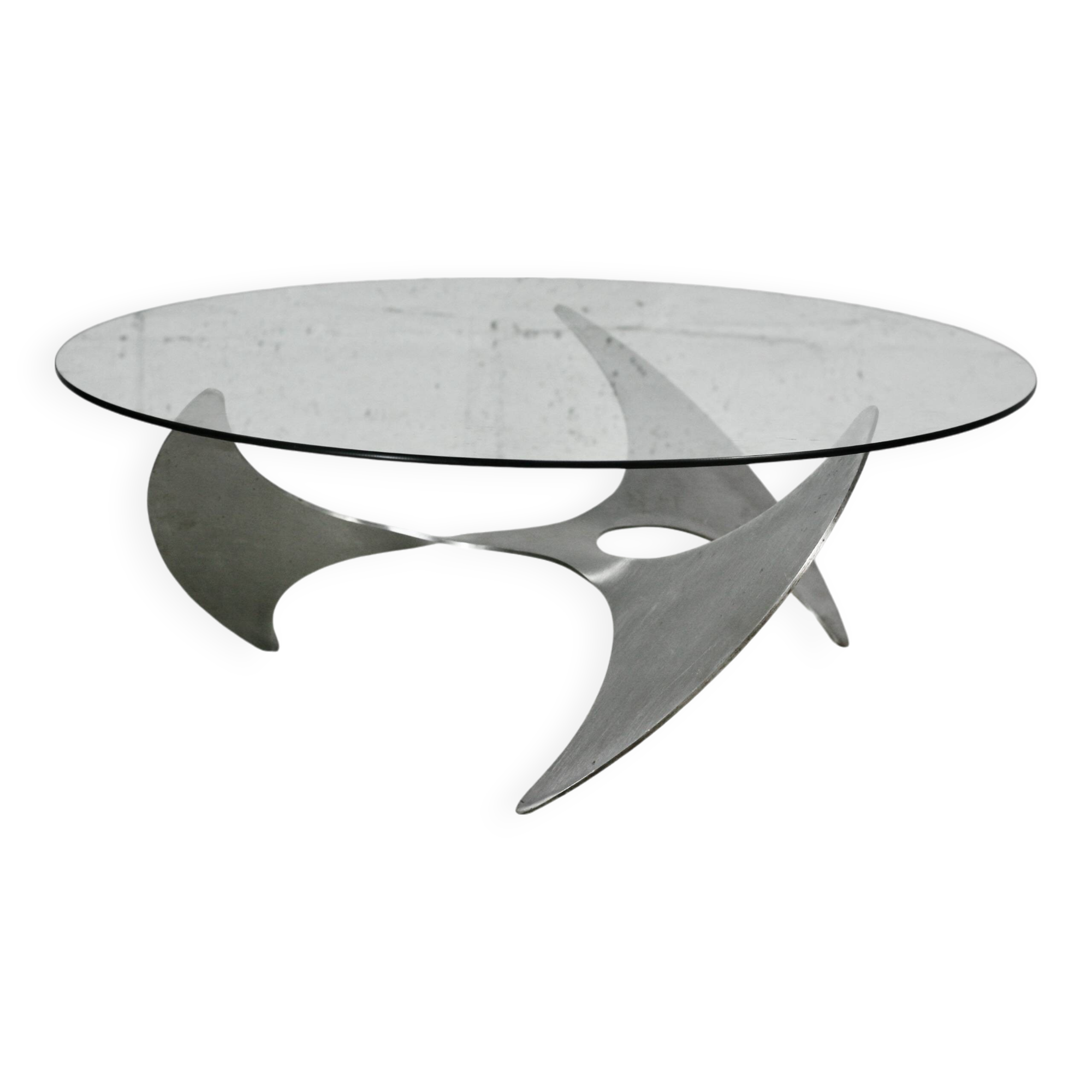 "space age" coffee table. Steel legs, glass slab. Circa 1970