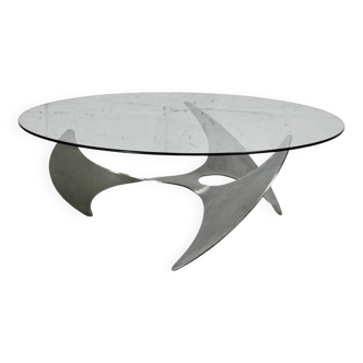 "space age" coffee table. Steel legs, glass slab. Circa 1970