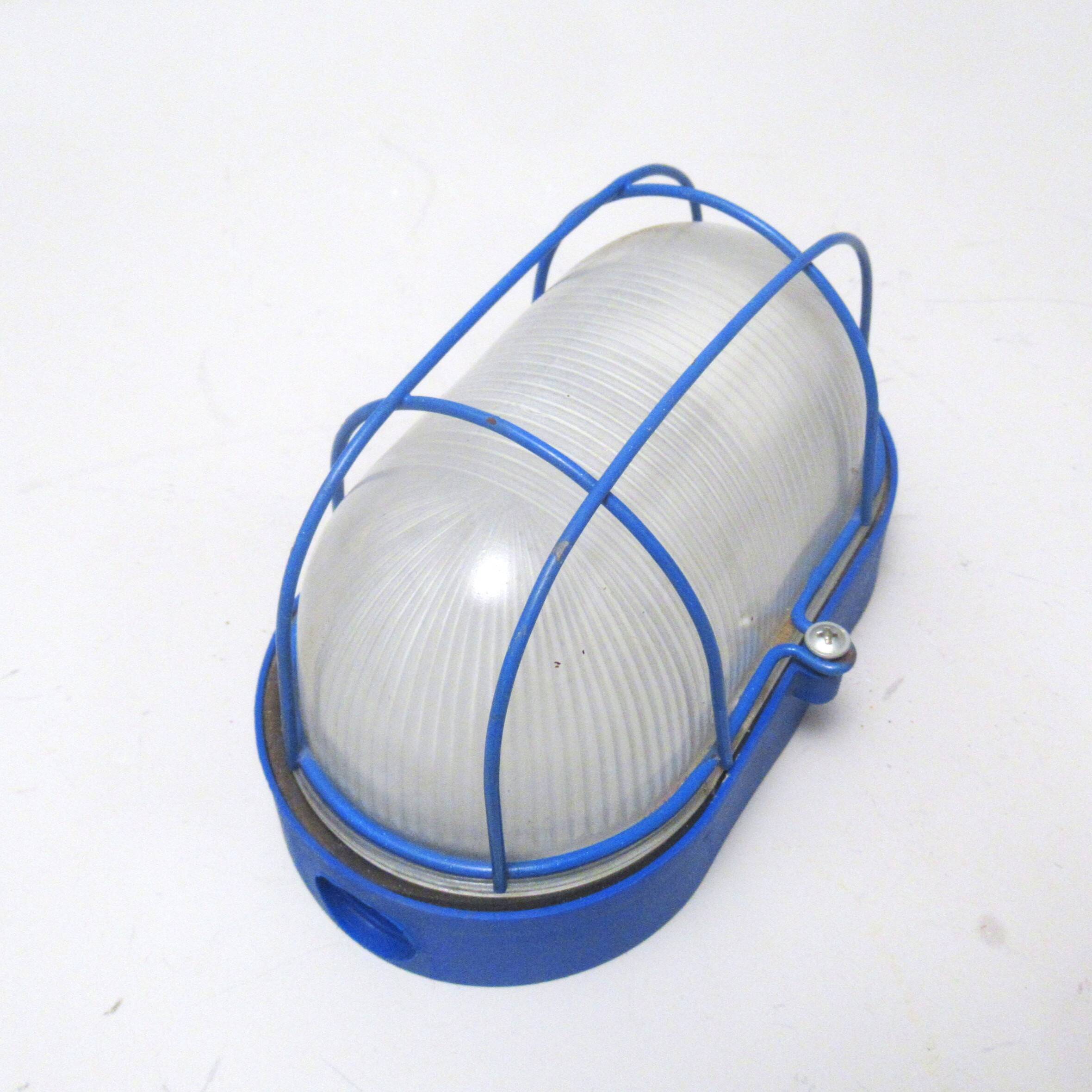 Blue industrial wall or ceiling light.