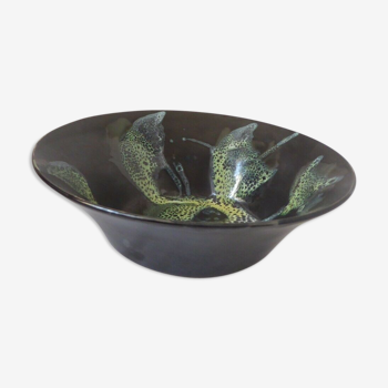 Black and green flamed ceramic cup