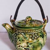 Set of old teapots and honey pot