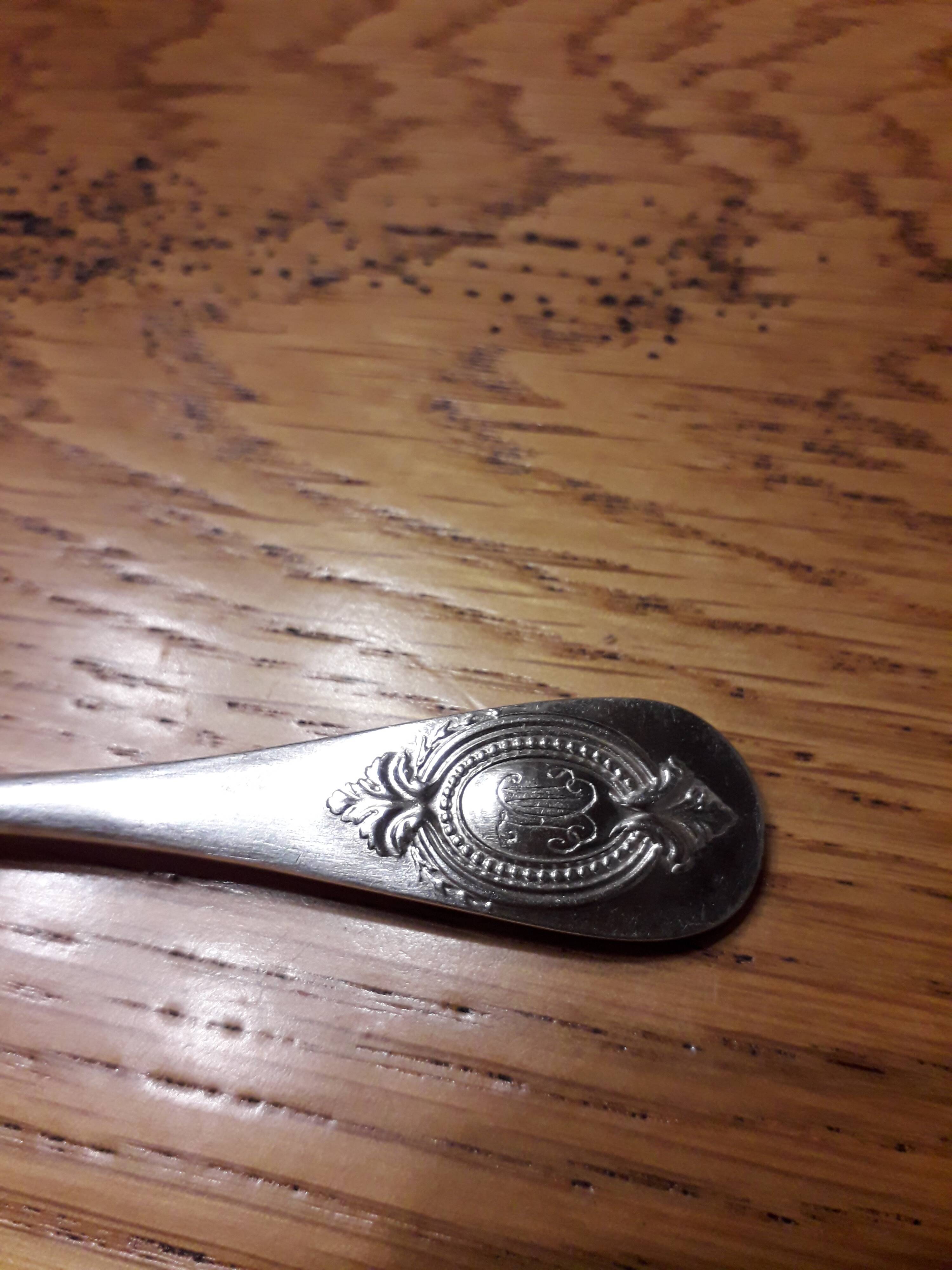 12 teaspoons silver metal