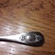 12 teaspoons silver metal