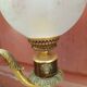 Paire de lampes style Napoléon III à têtes de lions