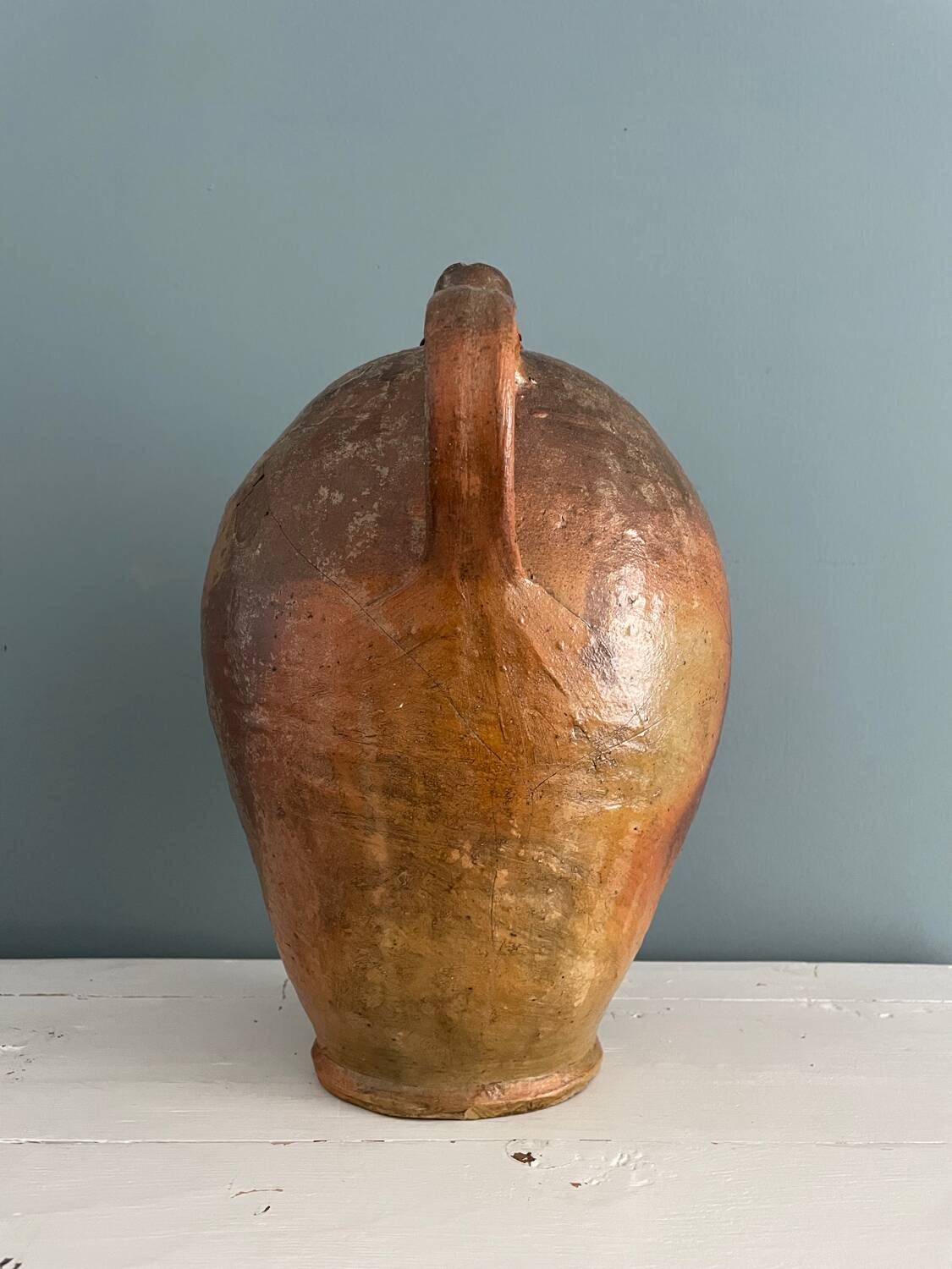 Large 19th century oil bottle in glazed earthenware