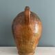 Large 19th century oil bottle in glazed earthenware