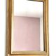 Miroir ancien en bois doré et cuivré