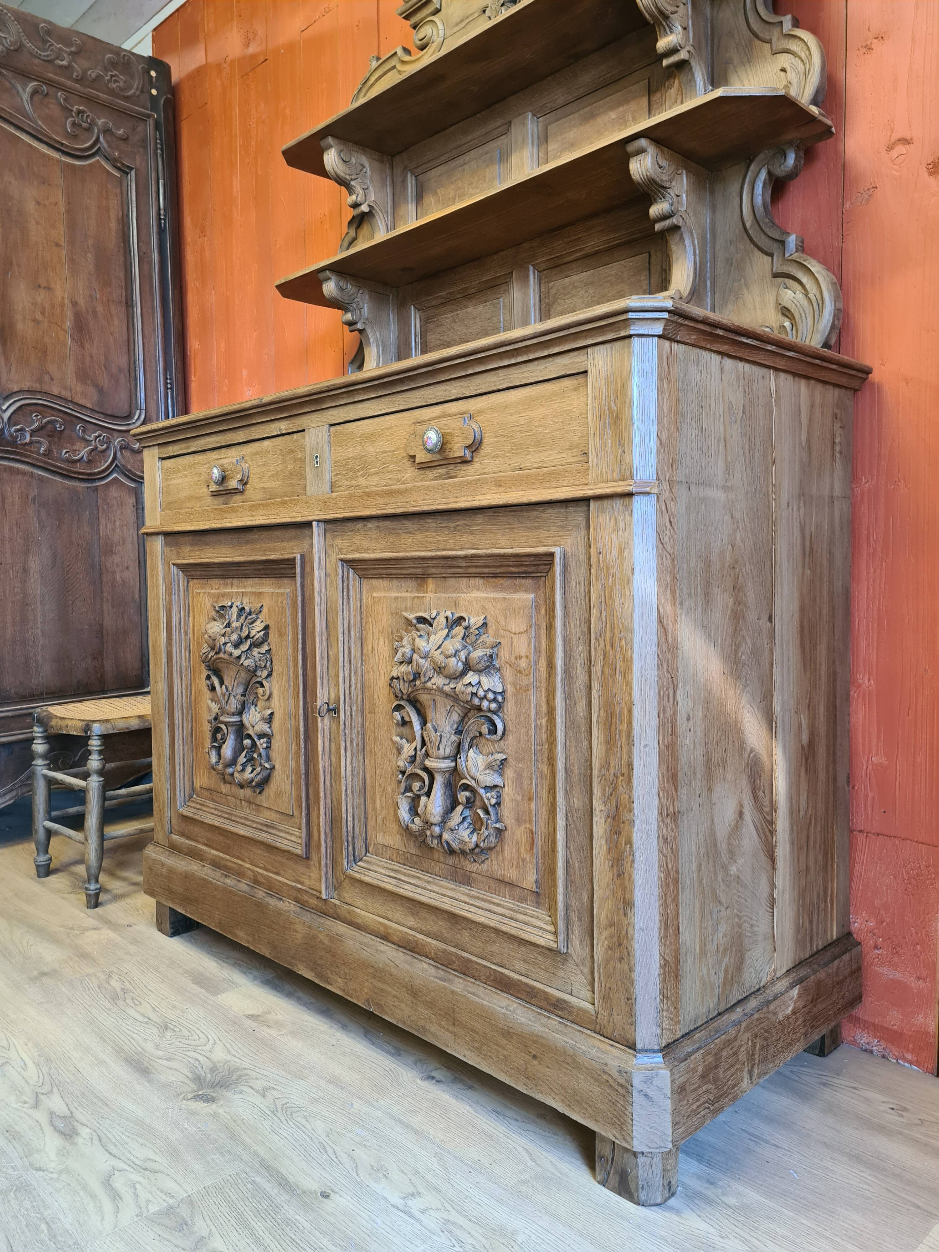 Saint Hubert oak cabinet with sculptures completely renovated