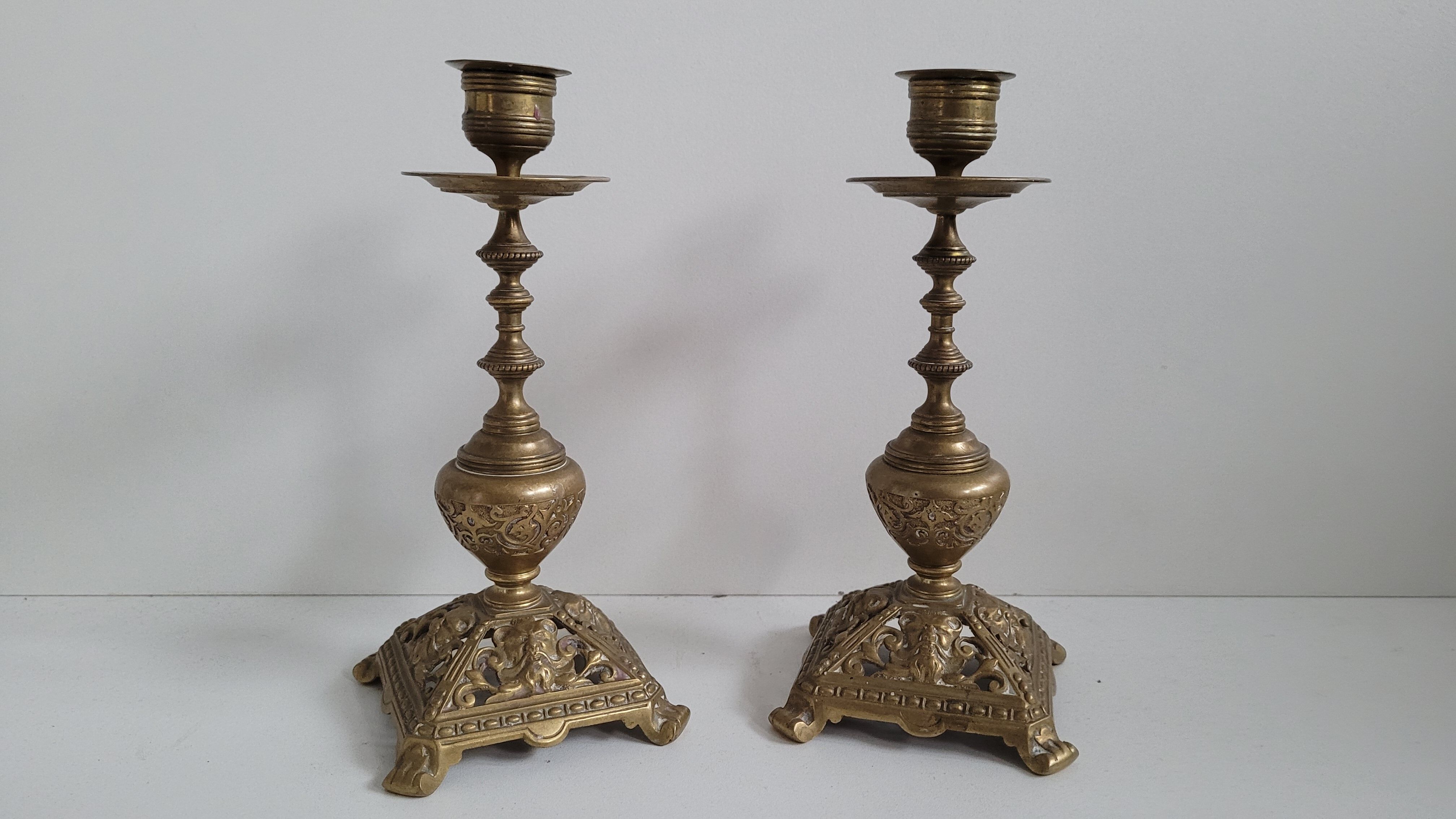 Duo worked brass candle holders