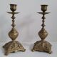 Duo worked brass candle holders
