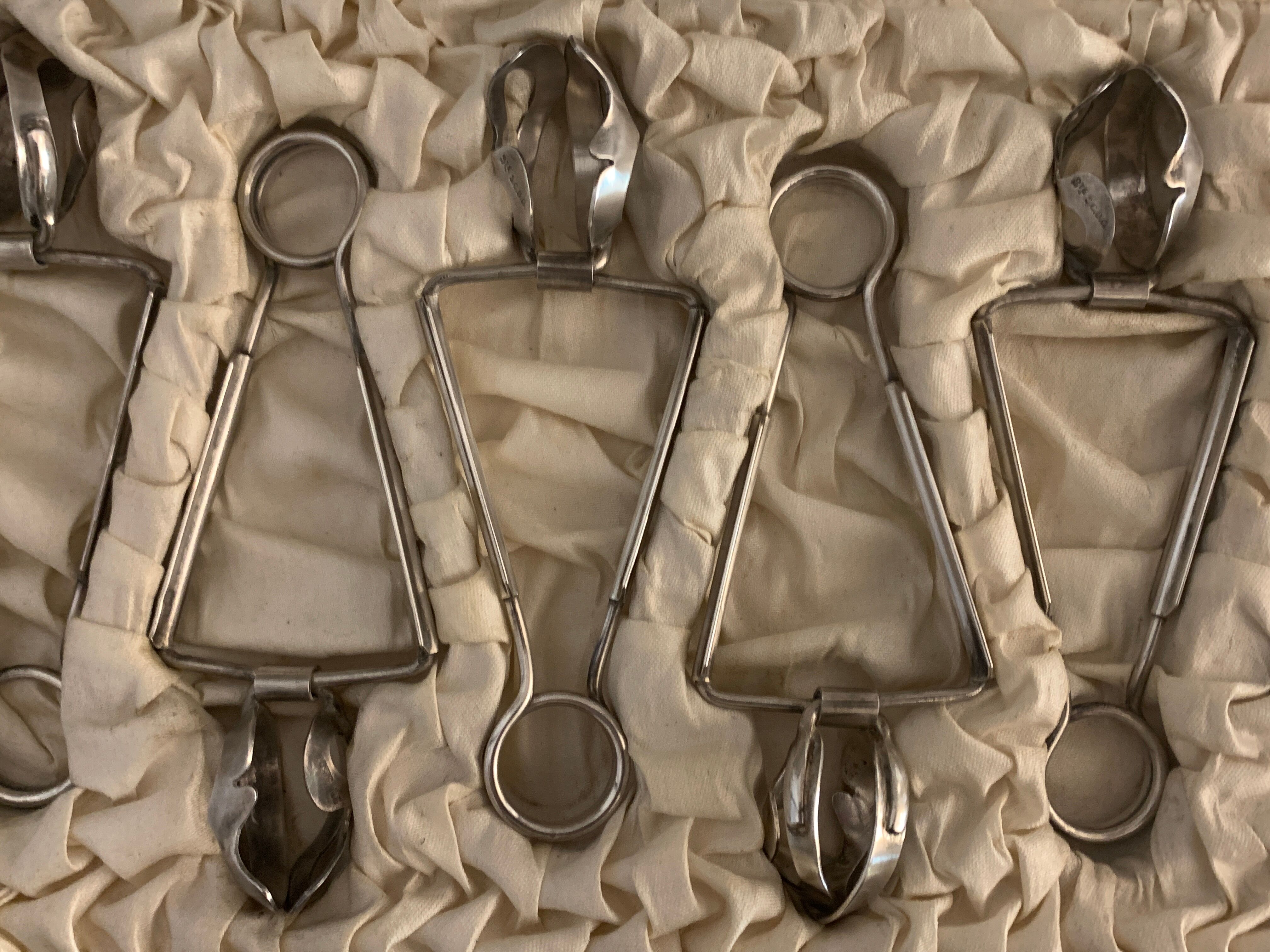 6 silver metal snail clips in their original box
