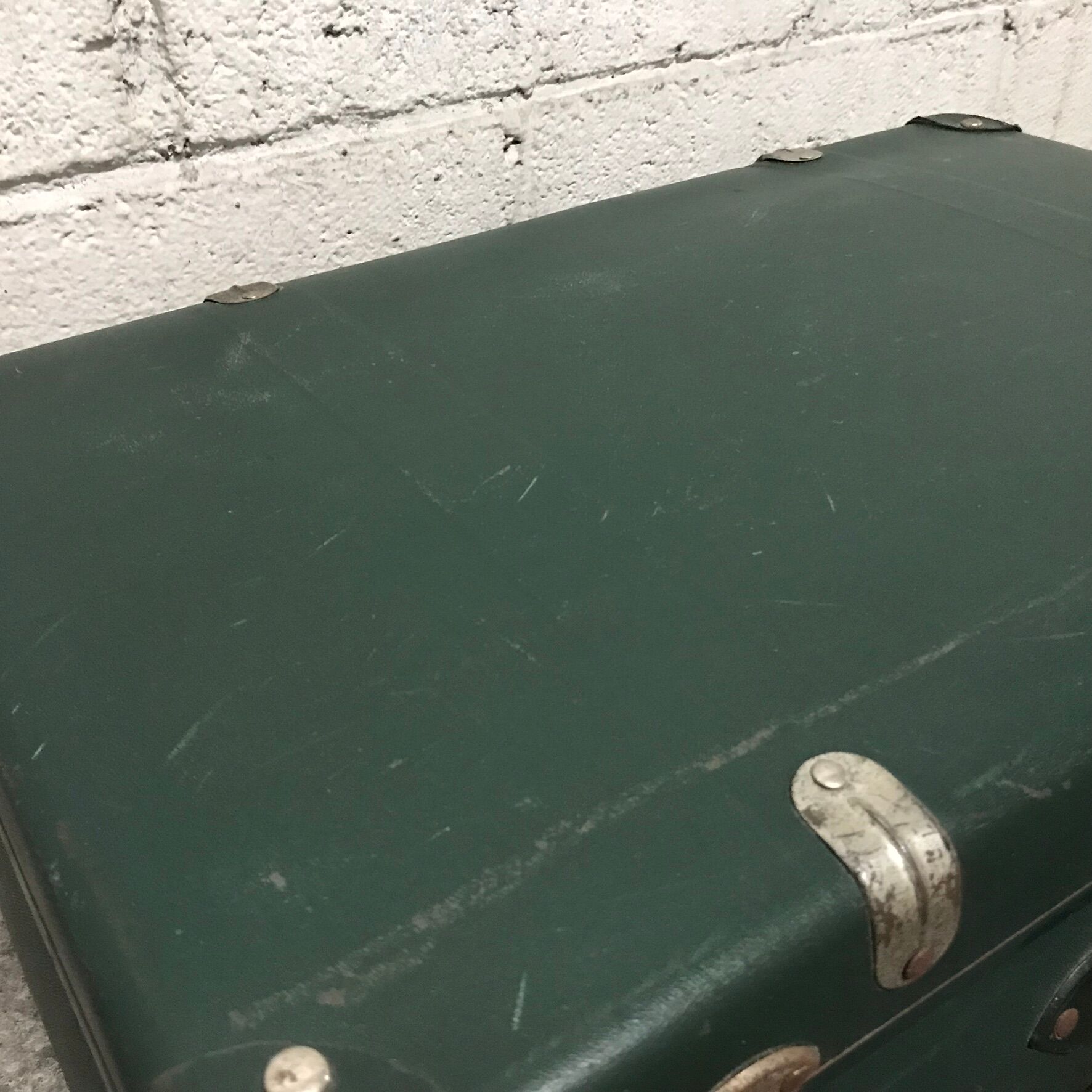 Vintage green case in vulcanized fiber