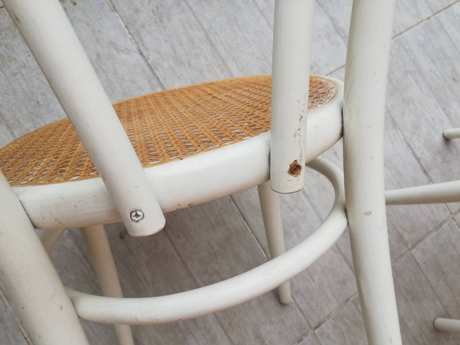 Lot of three Vintage ecru natural cane bistro chairs