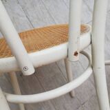 Lot of three Vintage ecru natural cane bistro chairs