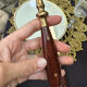 Wood and brass serving utensils