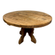Round table in solid wood, thick top, vintage brutalist style from the 1960s.