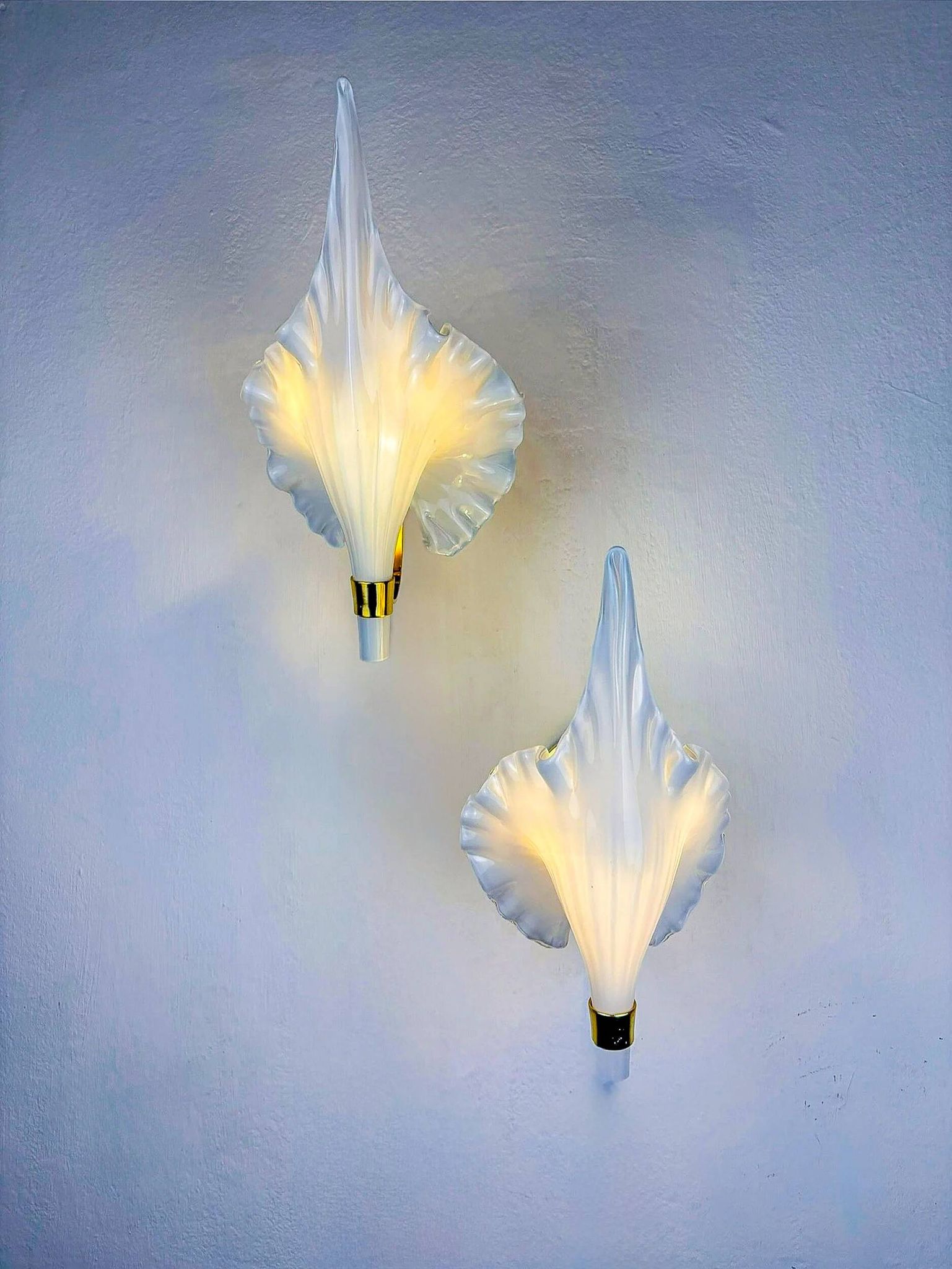 Pair of Italian "Calla Lily" leaf-shaped wall sconces, Murano glass & gilt brass, circa 1970s