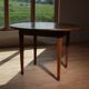 Round table in raw wood