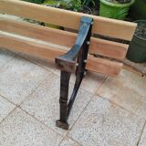 Garden bench with old cast iron legs