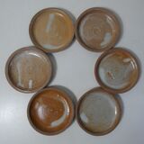 6 stoneware cups and saucers