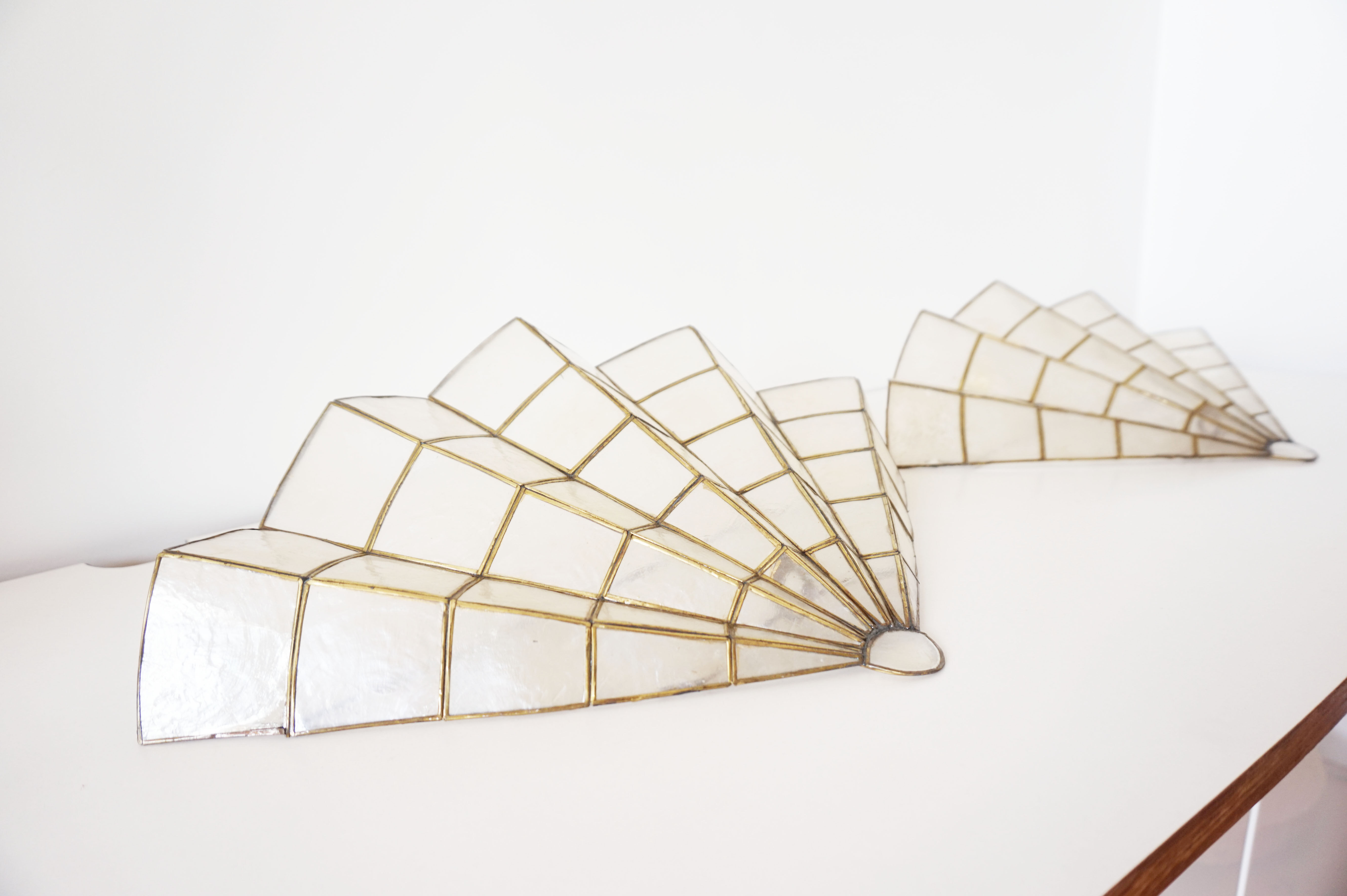 Pair of mother-of-pearl fan-shaped sconces